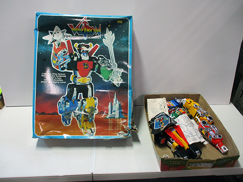 image of Voltron Poster with Assorted Toy Vehicles