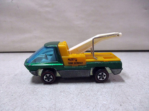 image of Hot Wheels Redline Green Die-Cast Tow Truck Toy with Yellow Tow Rig