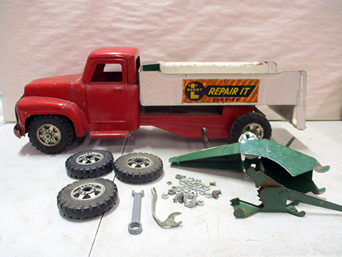 image of Tonka Toy Dump Truck with Accessories and Spare Parts