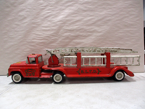 image of Tonka Pressed Steel Fire Truck Toy with Extendable Ladder