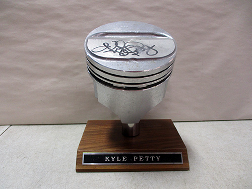 image of Kyle Petty Signed Racing Piston Head on Wood Base