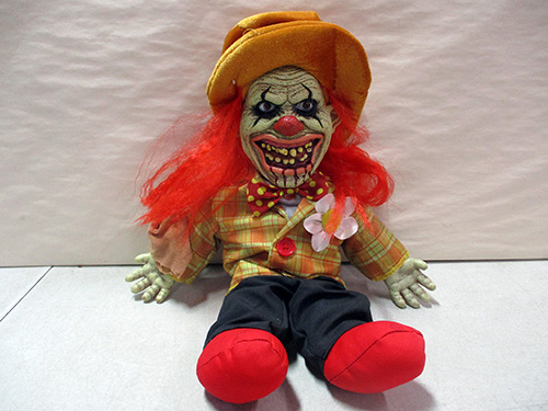 image of Spirit Halloween Creepy Clown Plush Toy in Costume
