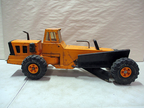 image of Tonka Orange Road Grader Toy with Black Blade