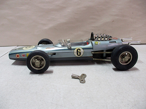 image of Schuco Tinplate Formula 1 Racing Car Toy with Wind-Up Key