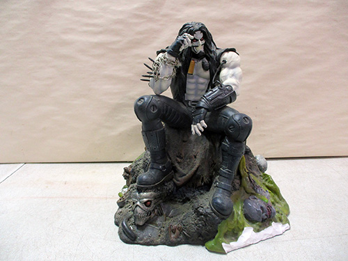 image of DC Direct Lobo Sitting on Skull Base Figurine