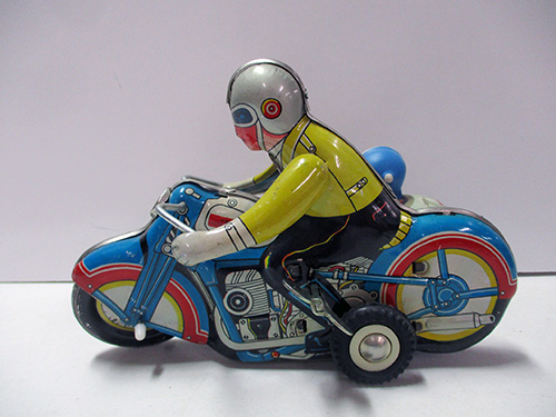 image of Tin Wind-Up Motorcycle Toy With Rider