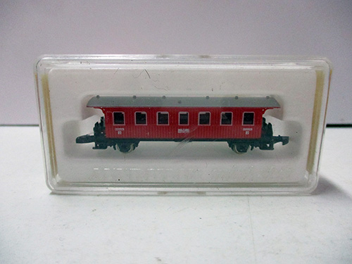 image of N Scale Red Passenger Car Model in Clear Case